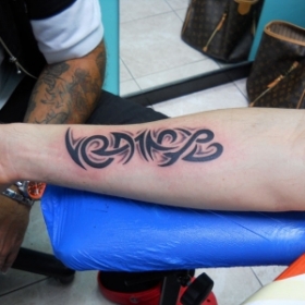 tatuaggio scritta ,,TATTOO FANTASY 